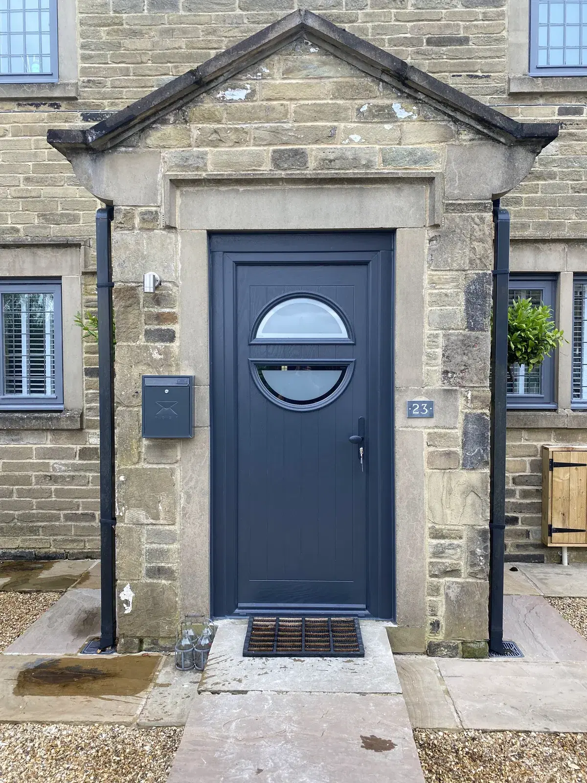 A tall glazed opening in a completed home extension.