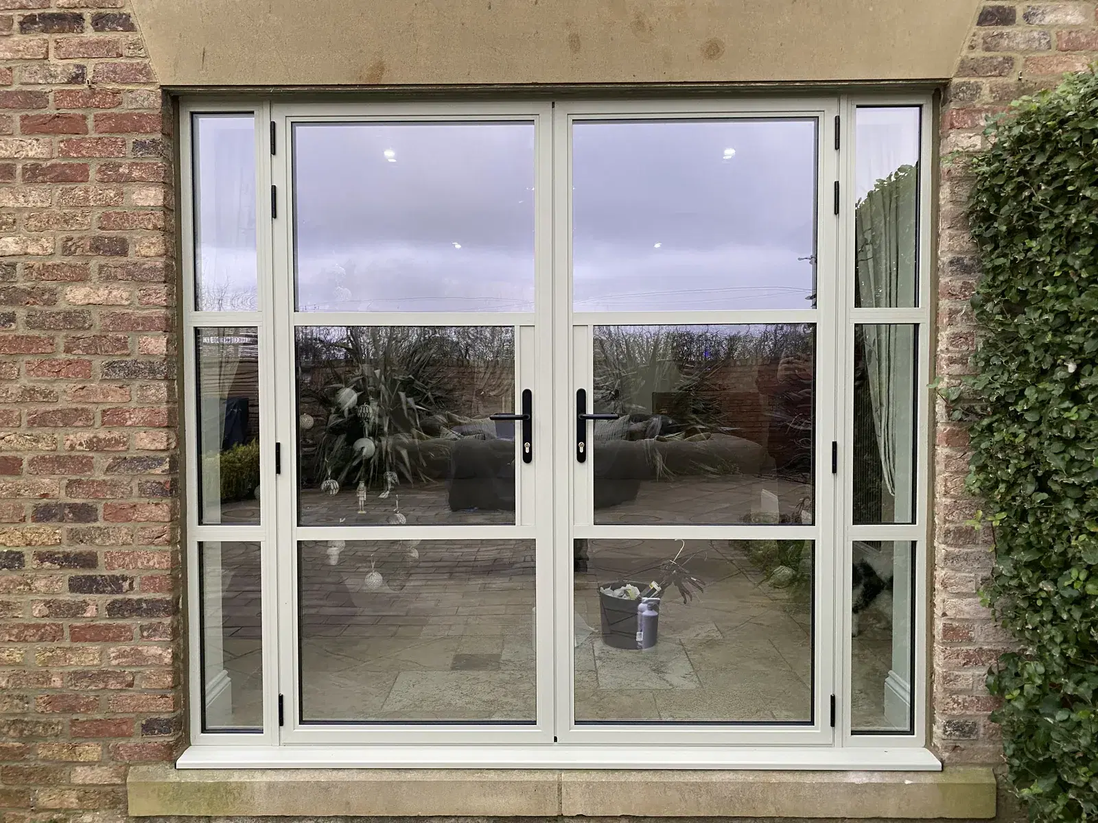 Traditional-proportioned heritage frames fitted to a period building.